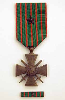 Croix de Guerre. France, 1914-1918 Bronze medal with green and red ribbon, one bronze star (regimental dispatch citation) and bar