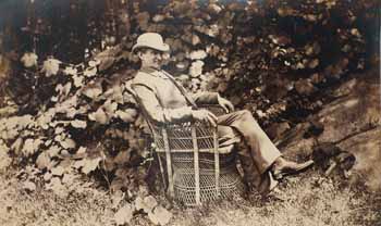 Francis Parkman seated in wicker chair, facing right Photograph