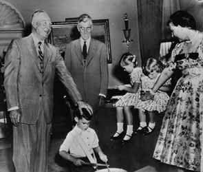 Dwight Eisenhower and Leverett Saltonstall and Eisenhower`s family (David Eisenhower, Barbara Ann Eisenhower, Susan Eisenhower and Mamie Eisenhower) Black and white photograph