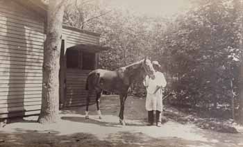 Horse with groom, Brent Photograph