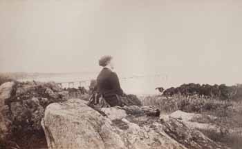 Mrs. Joseph Bell on rock at Smith`s Point Photograph