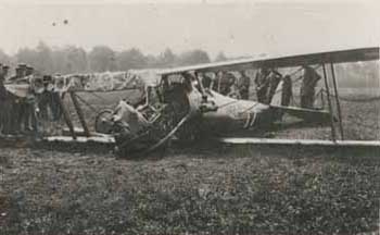 Damaged airplane of Atlantic Monthly correspondent James Norman Hall in German territory Photograph