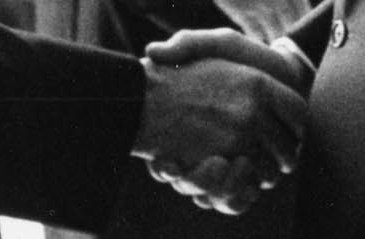 Detail of photograph of handshake between Leverett Saltonstall and Lyndon Johnson at the White House